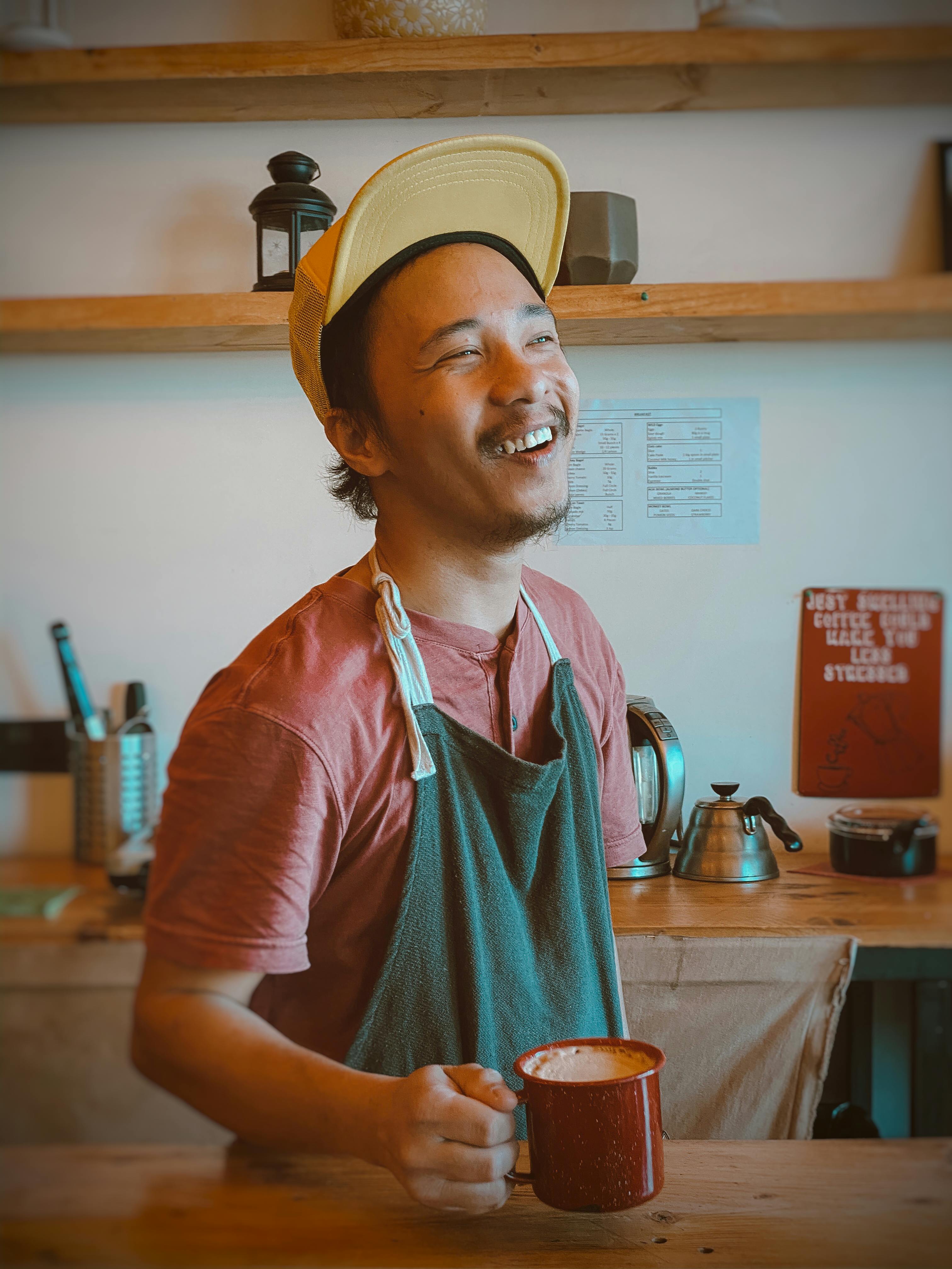 Un barista heureux | Source : Pexels