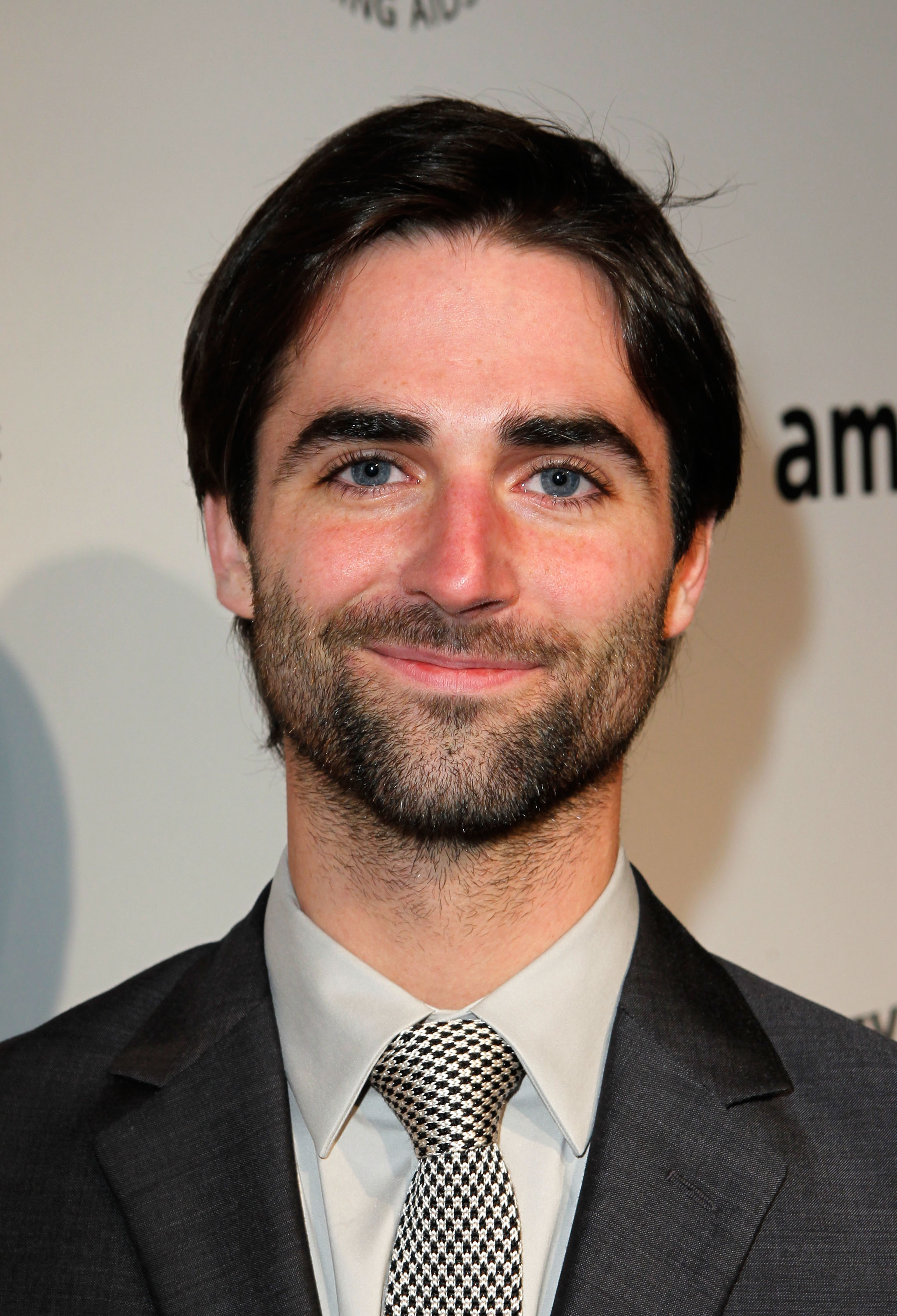 Quinn Tivey arrive au gala d'inspiration de l'amfAR à Los Angeles le 27 octobre 2011. | Source : Getty Images