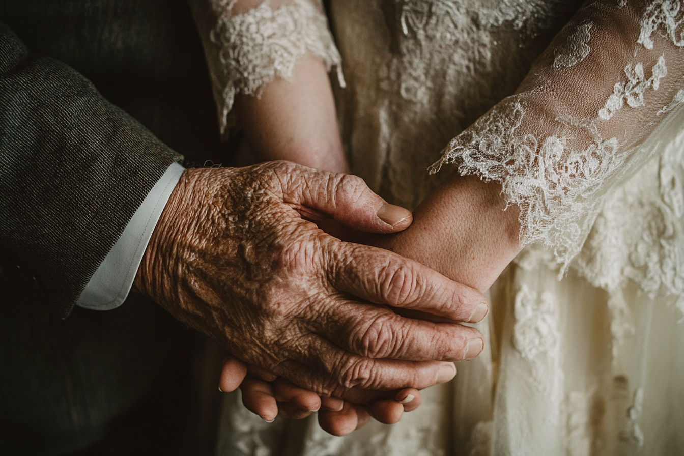 Un homme tenant les mains de sa fille | Source : Midjourney
