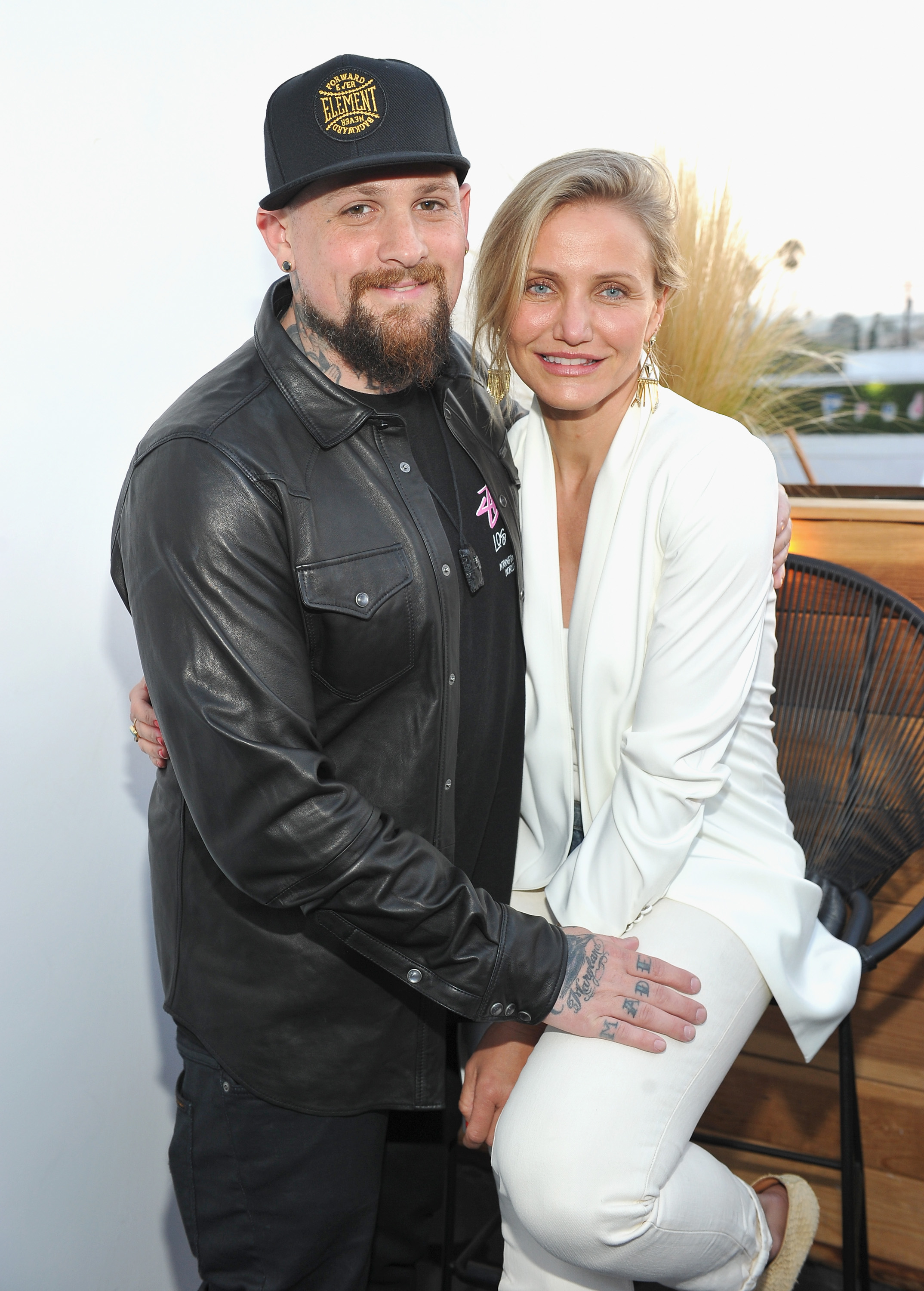 Le guitariste Benji Madden et l'actrice Cameron Diaz assistent au défilé House of Harlow 1960 x REVOLVE le 2 juin 2016 à Los Angeles, Californie | Source : Getty Images