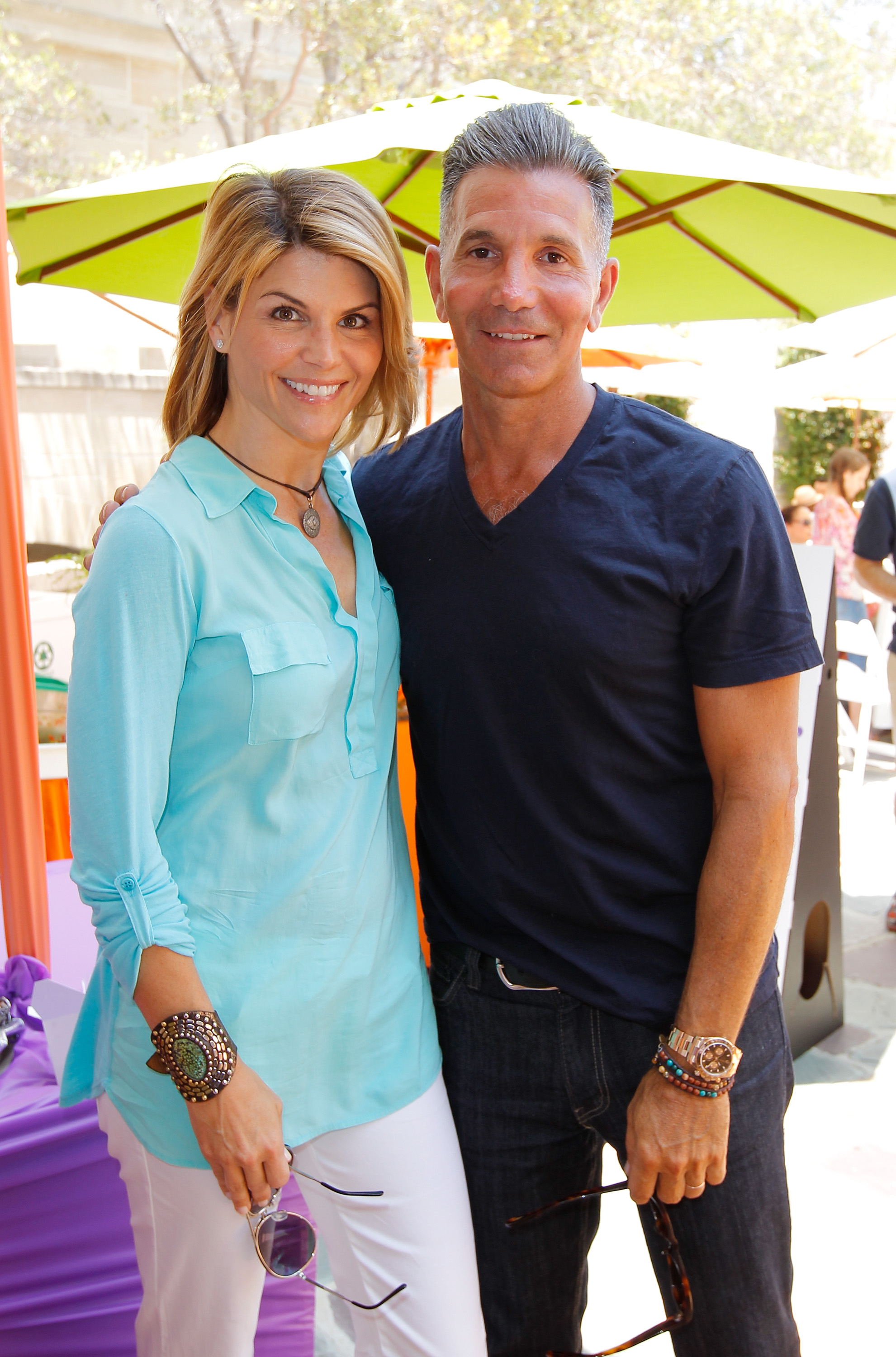 Lori Loughlin et Mossimo Giannulli assistent au 6e festival annuel de musique et d'arts Kidstock au Greystone Mansion à Beverly Hills le 3 juin 2012 | Source : Getty Images