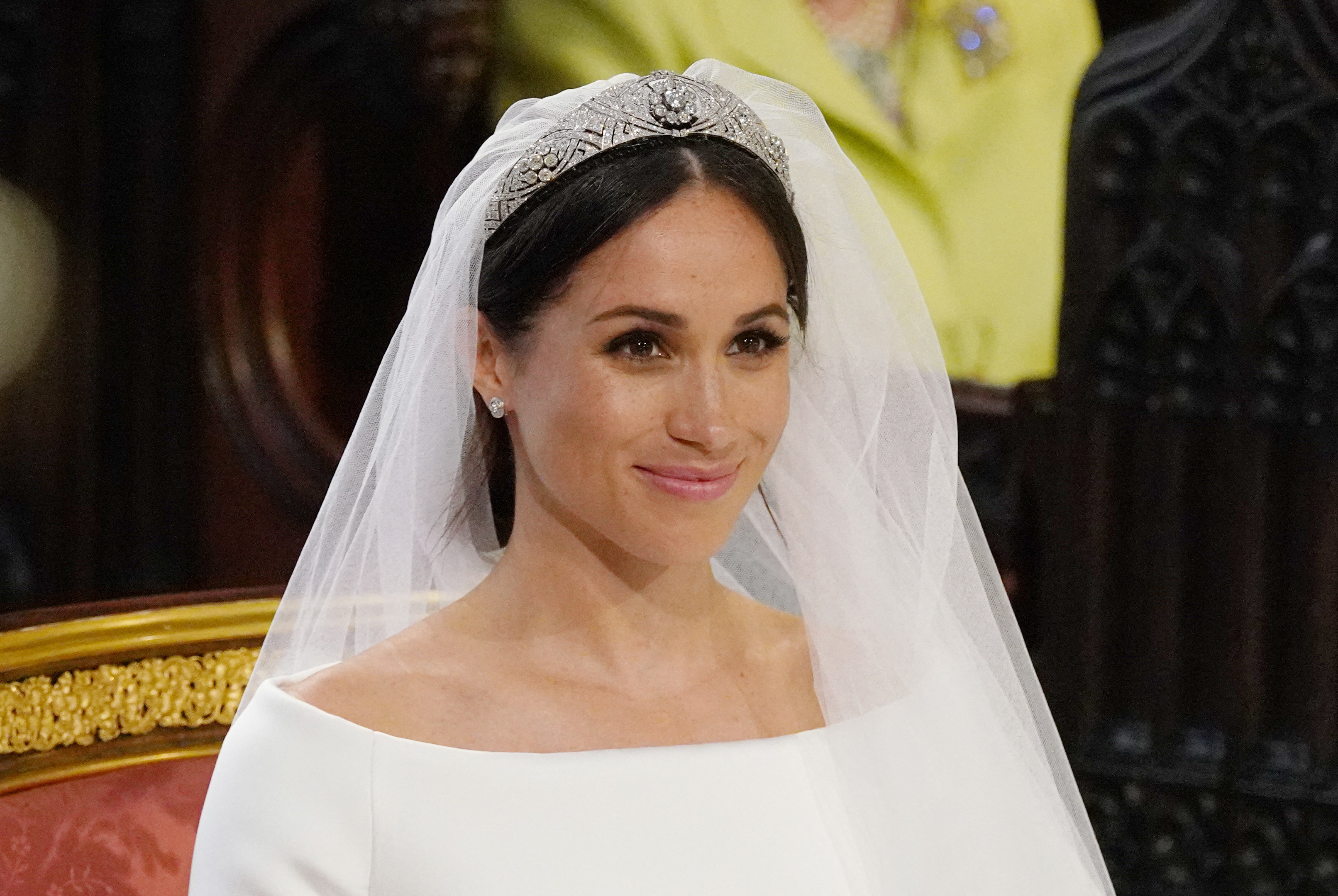 Meghan Markle arrive à l'autel pour son mariage avec le prince Harry dans la chapelle Saint-Georges du château de Windsor, le 19 mai 2018 | Source : Getty Images