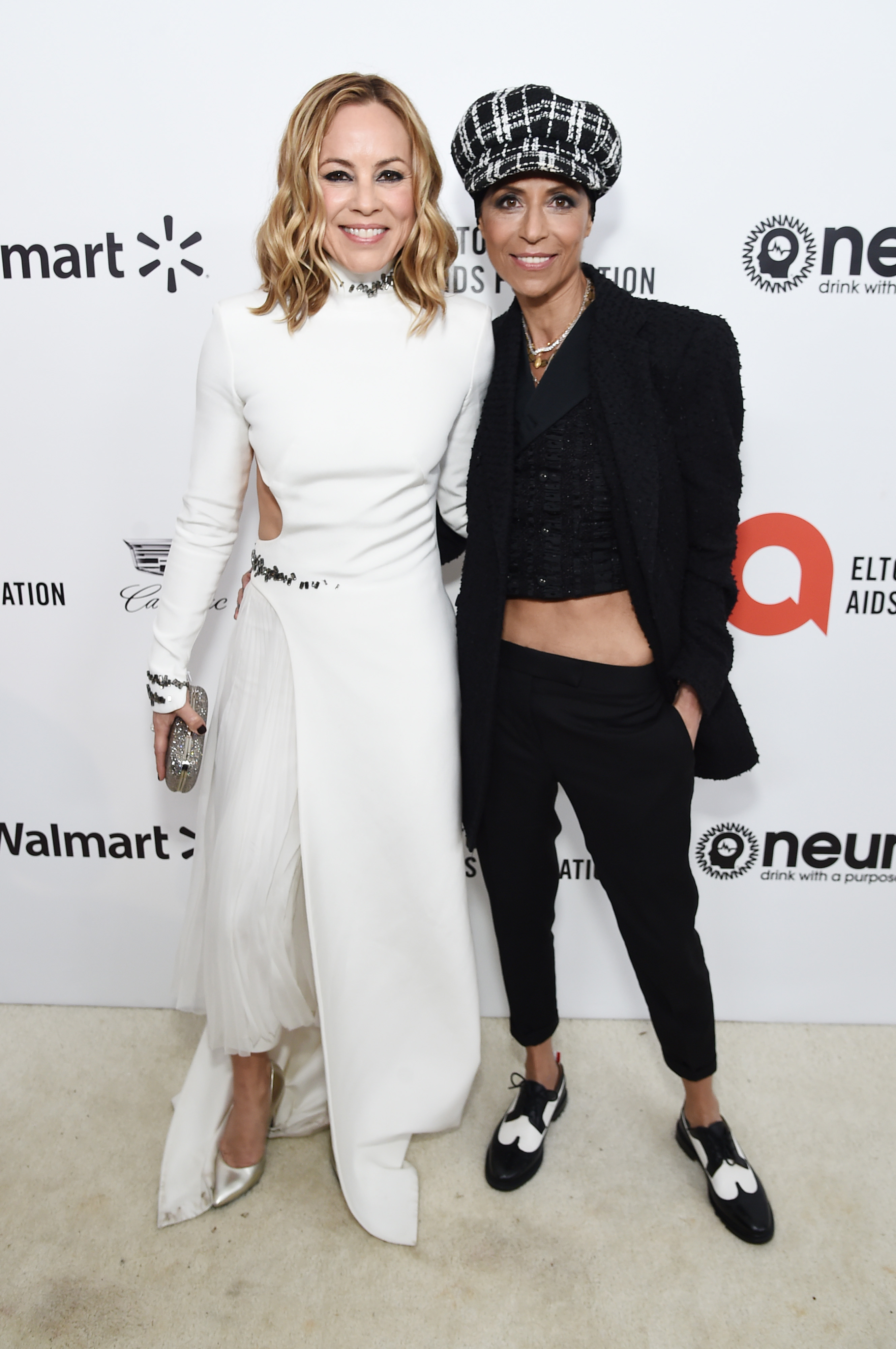 Maria Bello et Dominique Crenn lors de la 28e soirée annuelle de visionnage des Oscars de la fondation Elton John AIDS, le 9 février 2020, à West Hollywood, en Californie. | Source : Getty Images
