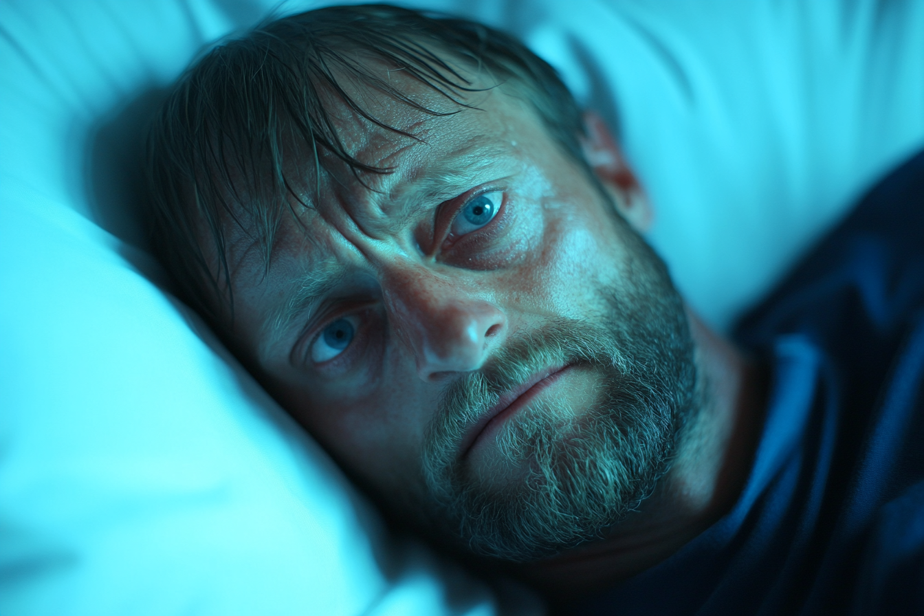 Un homme triste sur un lit d'hôpital | Source : Midjourney