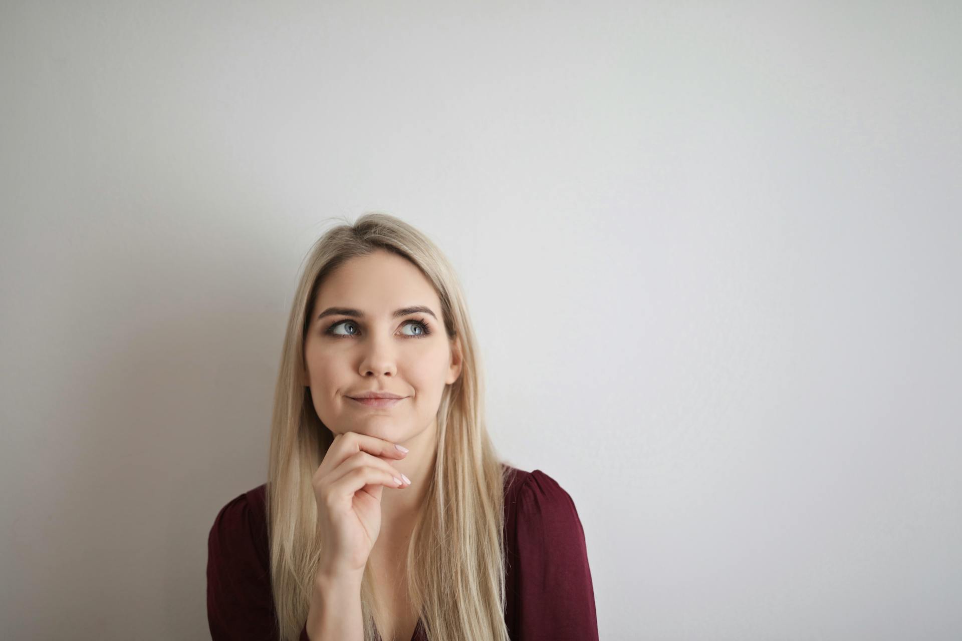 Une femme souriante | Source : Pexels