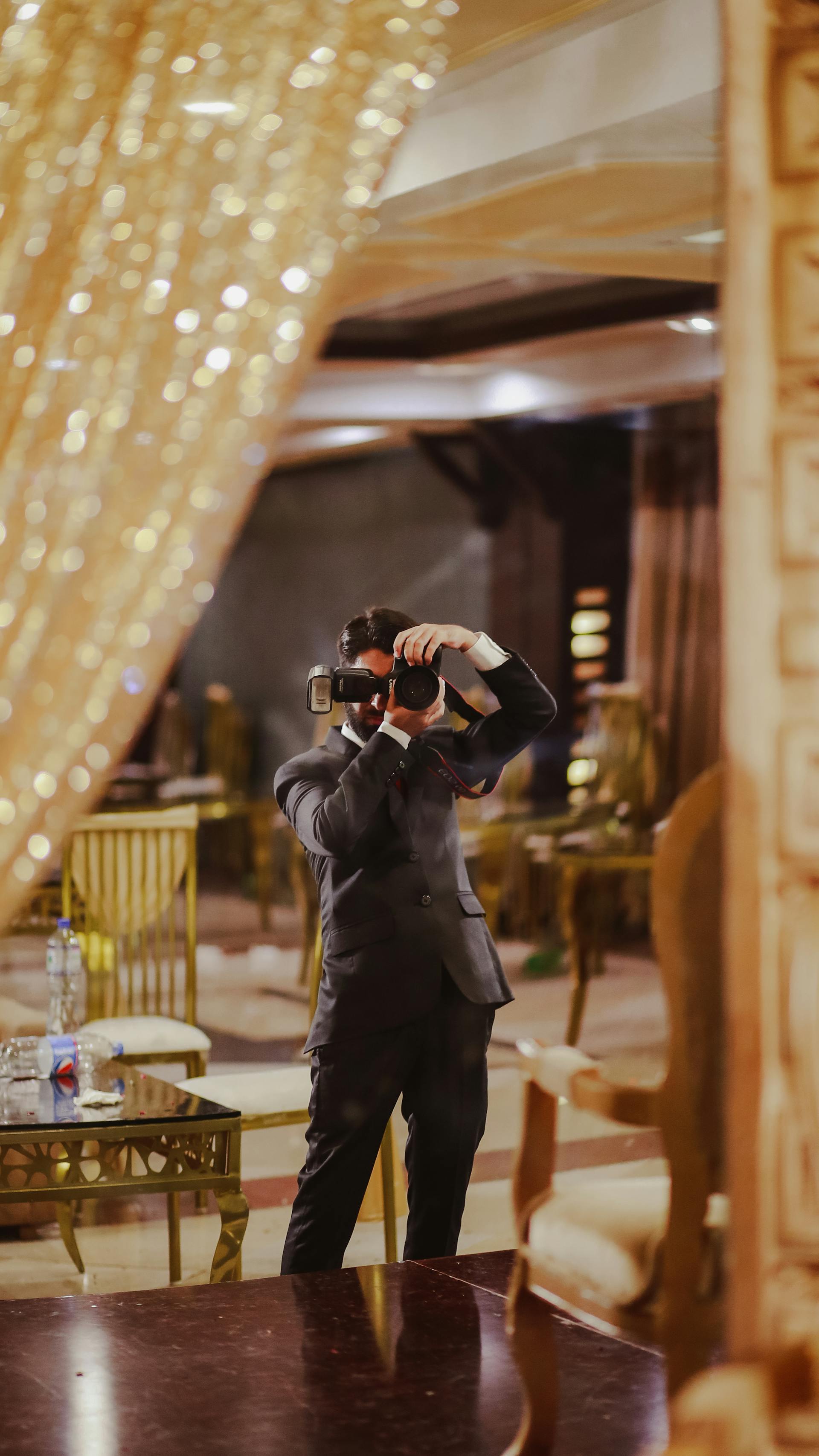 Un photographe qui prend des photos | Source : Pexels