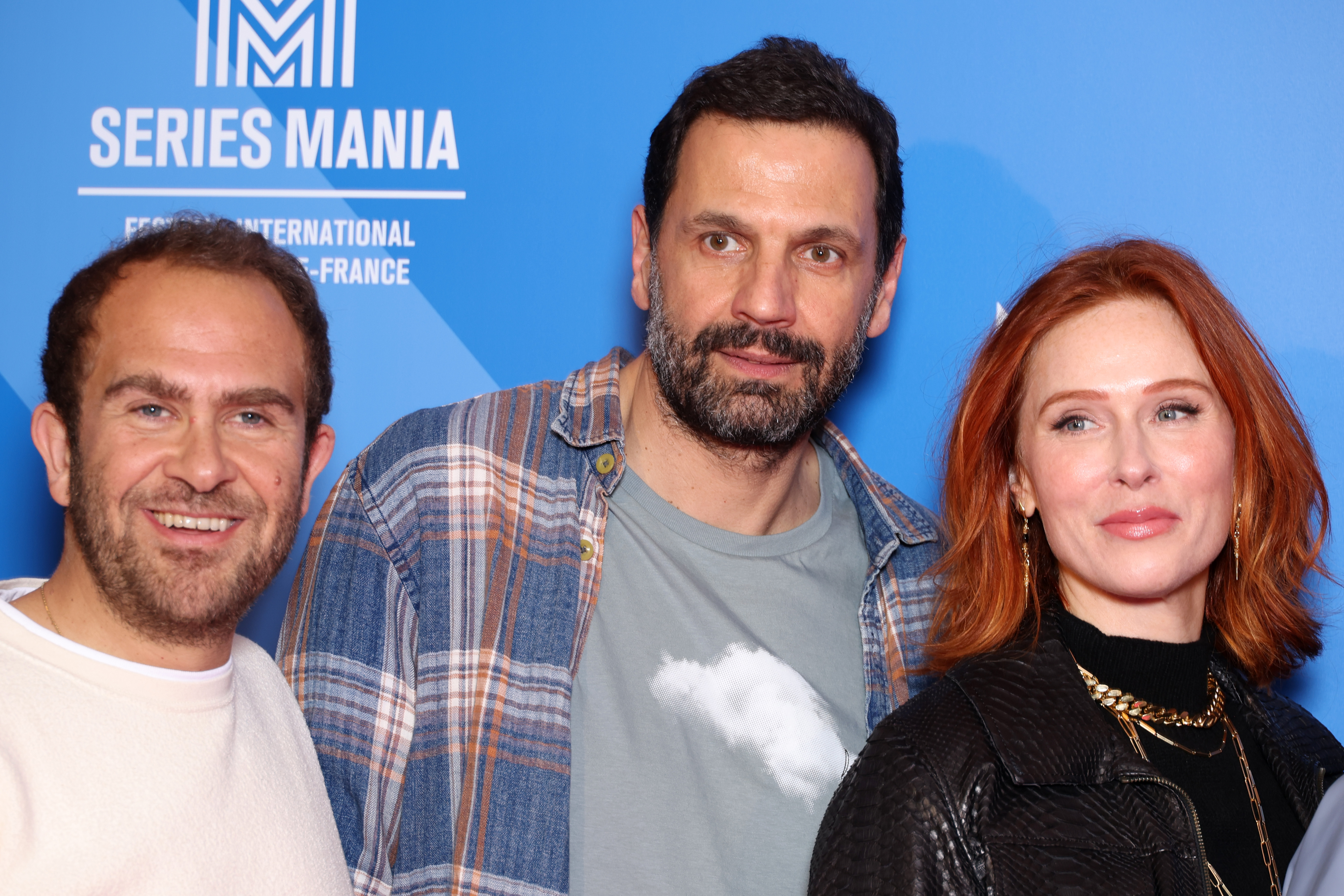 Anthony Lancret, Mehdi Nebbou et Audrey Fleurot assistent au photocall de la saison 4 de HPI lors du Festival Series Mania, le 16 mars 2024 à Lille, en France I Source : Getty Images