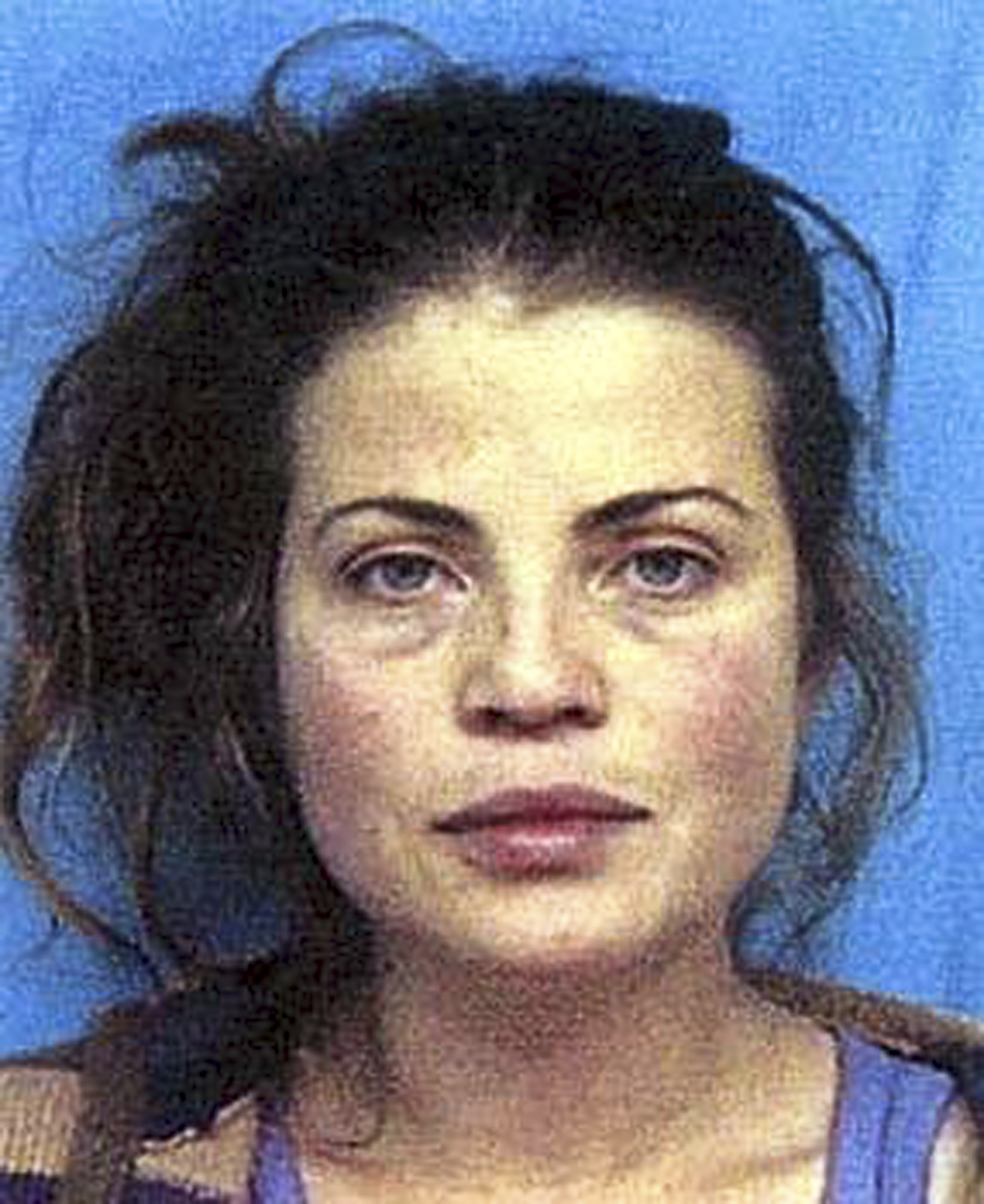 Yasmine Bleeth sur une photo d'identité judiciaire prise après son arrestation pour possession de cocaïne à Romulus, dans le Michigan, le 12 septembre 2001 | Source : Getty Images