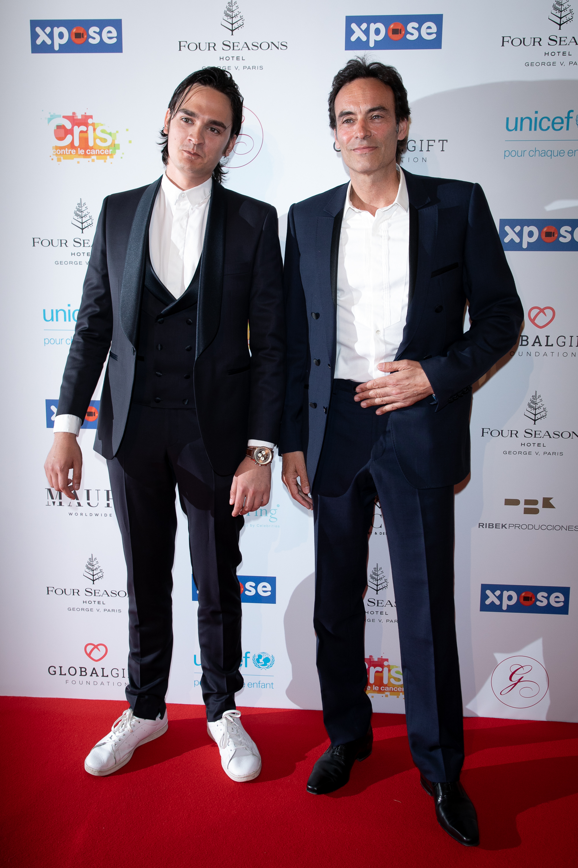Deux des fils du célèbre acteur au Global Gift Gala à Paris, France le 3 juin 2019 | Source : Getty Images