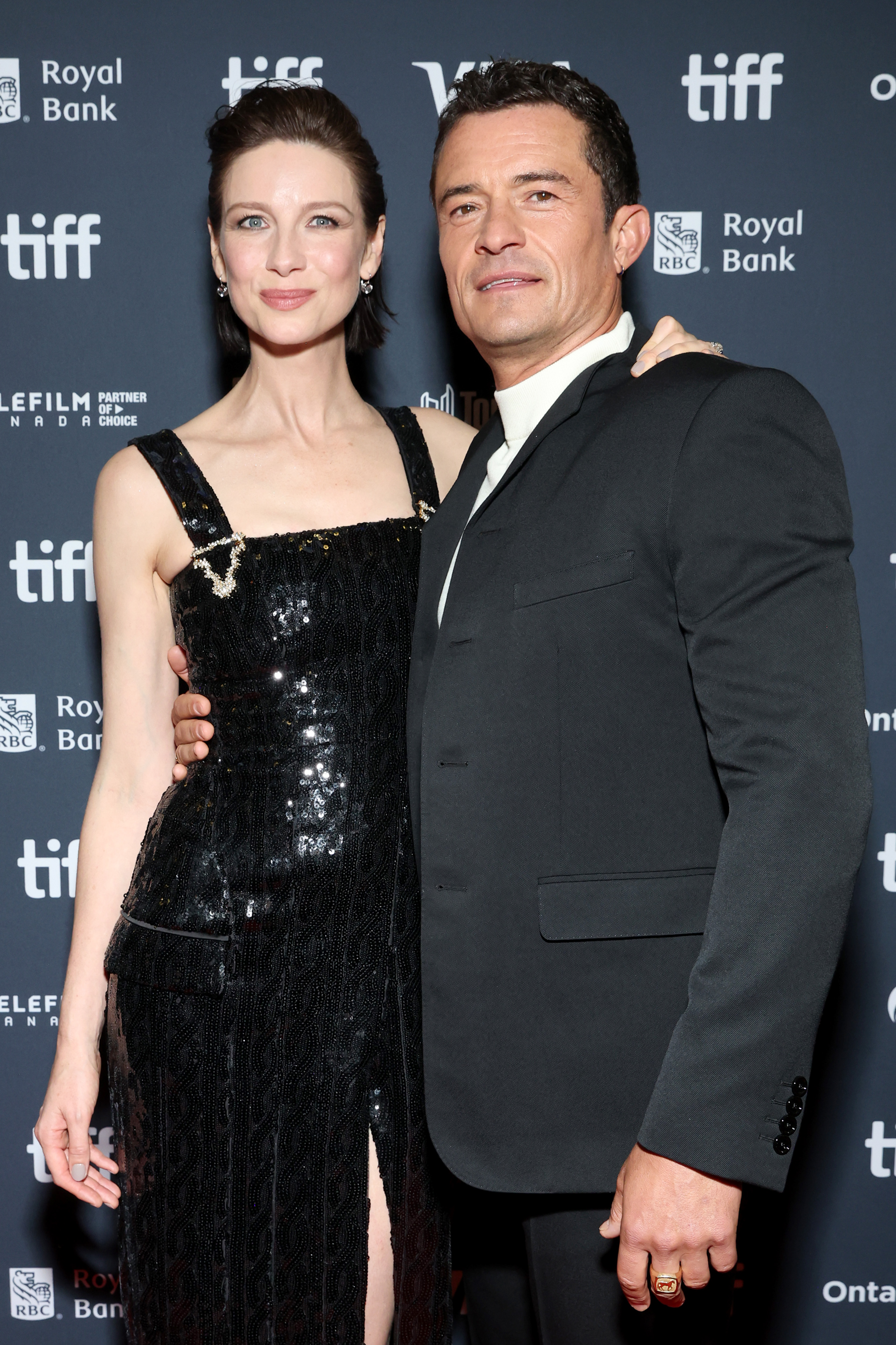Orlando Bloom photographié avec une autre femme lors de la première de « The Cut » pendant le Festival international du film de Toronto, le 5 septembre 2024 | Source : Getty Images