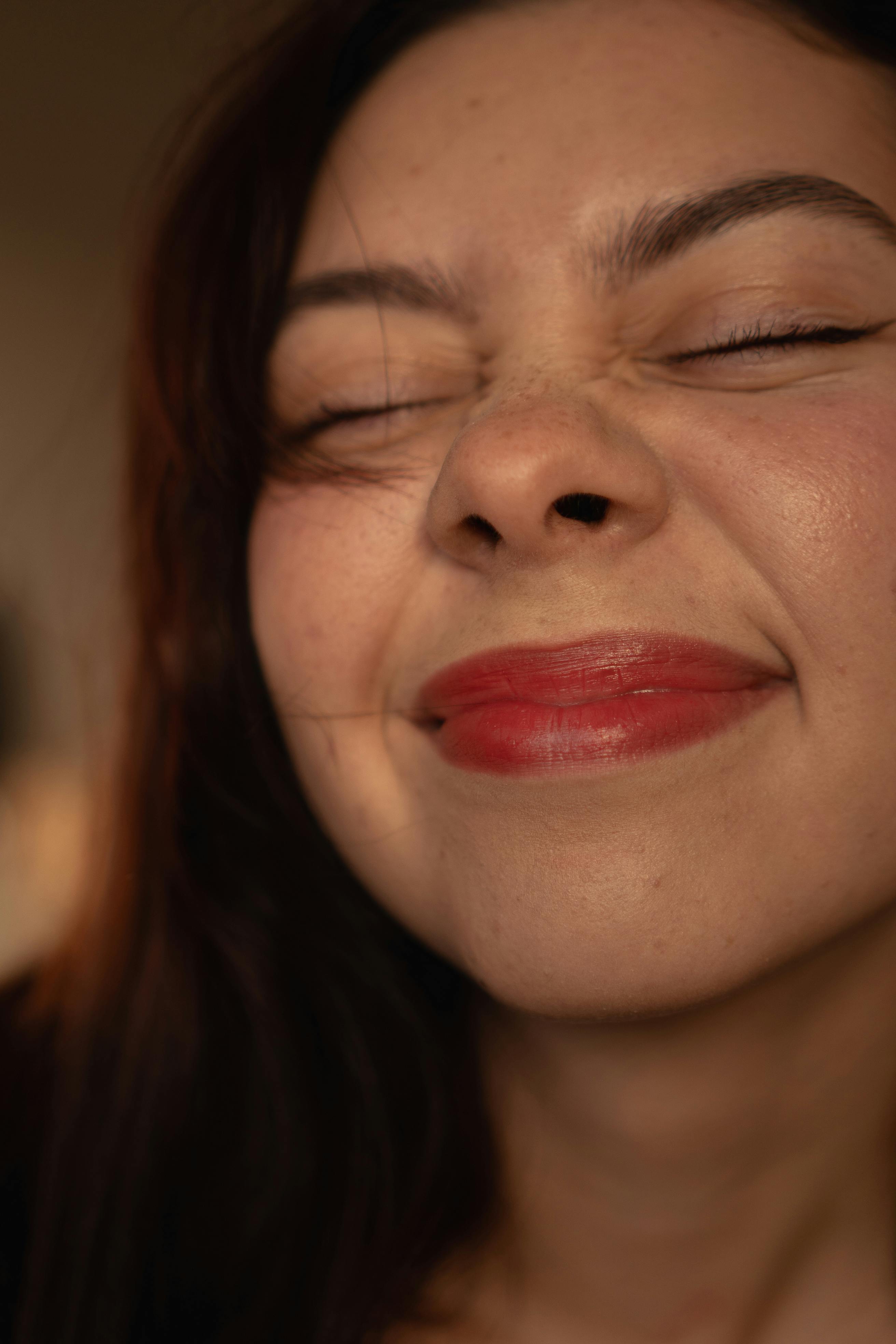 Une femme souriante | Source : Pexels