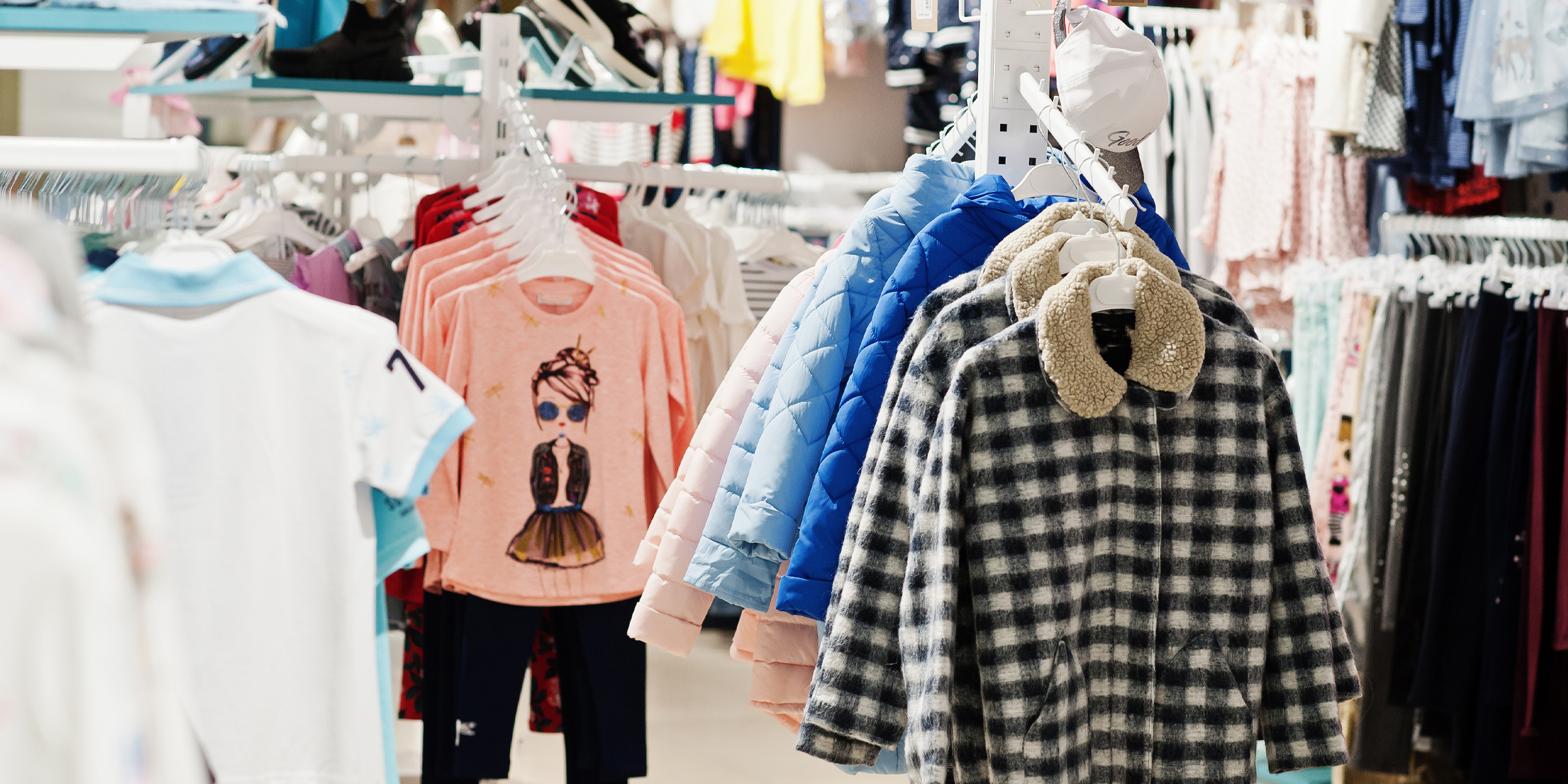Un magasin de vêtements | Source : Freepik