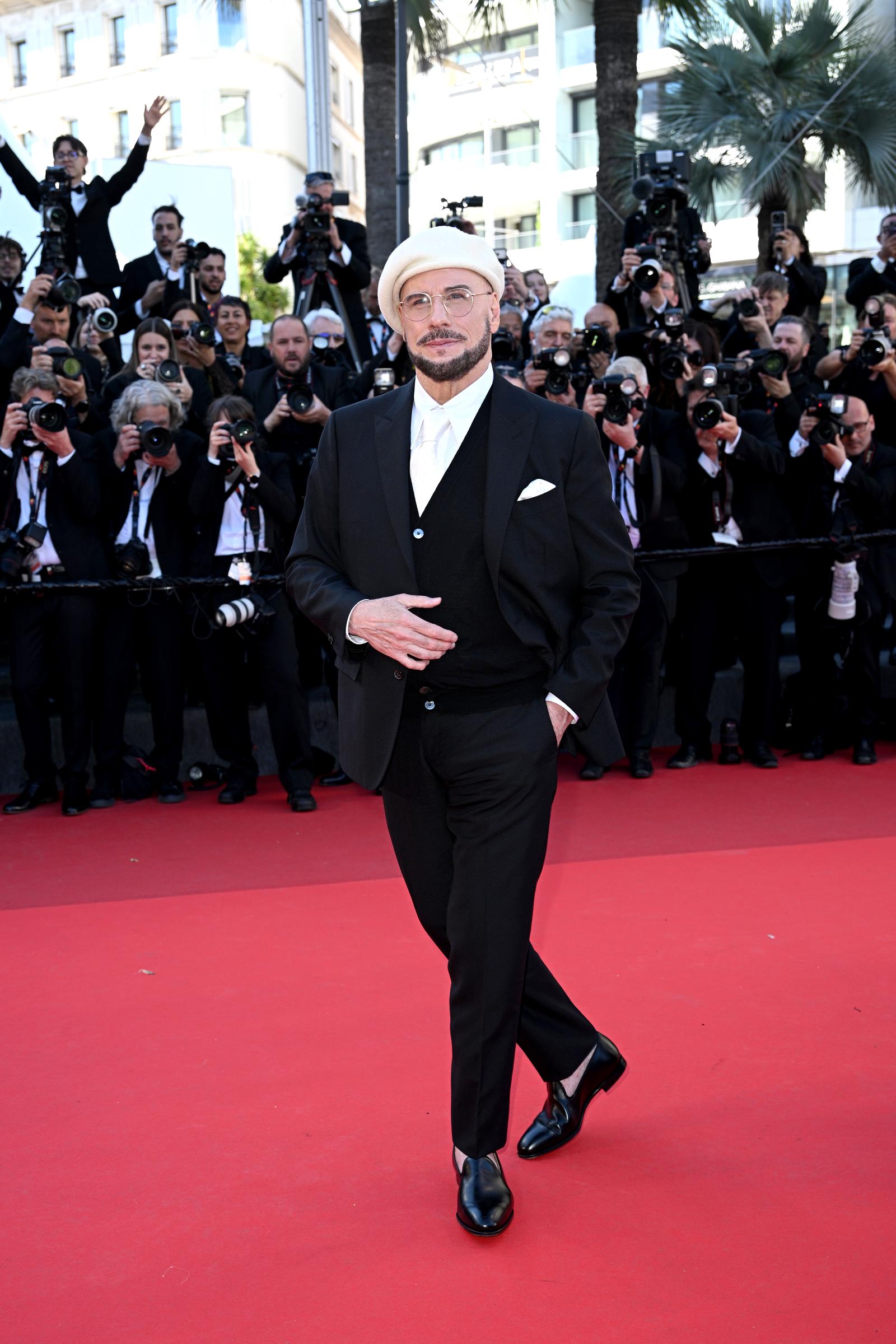 John Travolta assiste à la projection du film « Karma » lors du 79e Festival de Cannes, au Palais des Festivals, le 15 mai 2026 à Cannes, en France. | Source : Getty Images