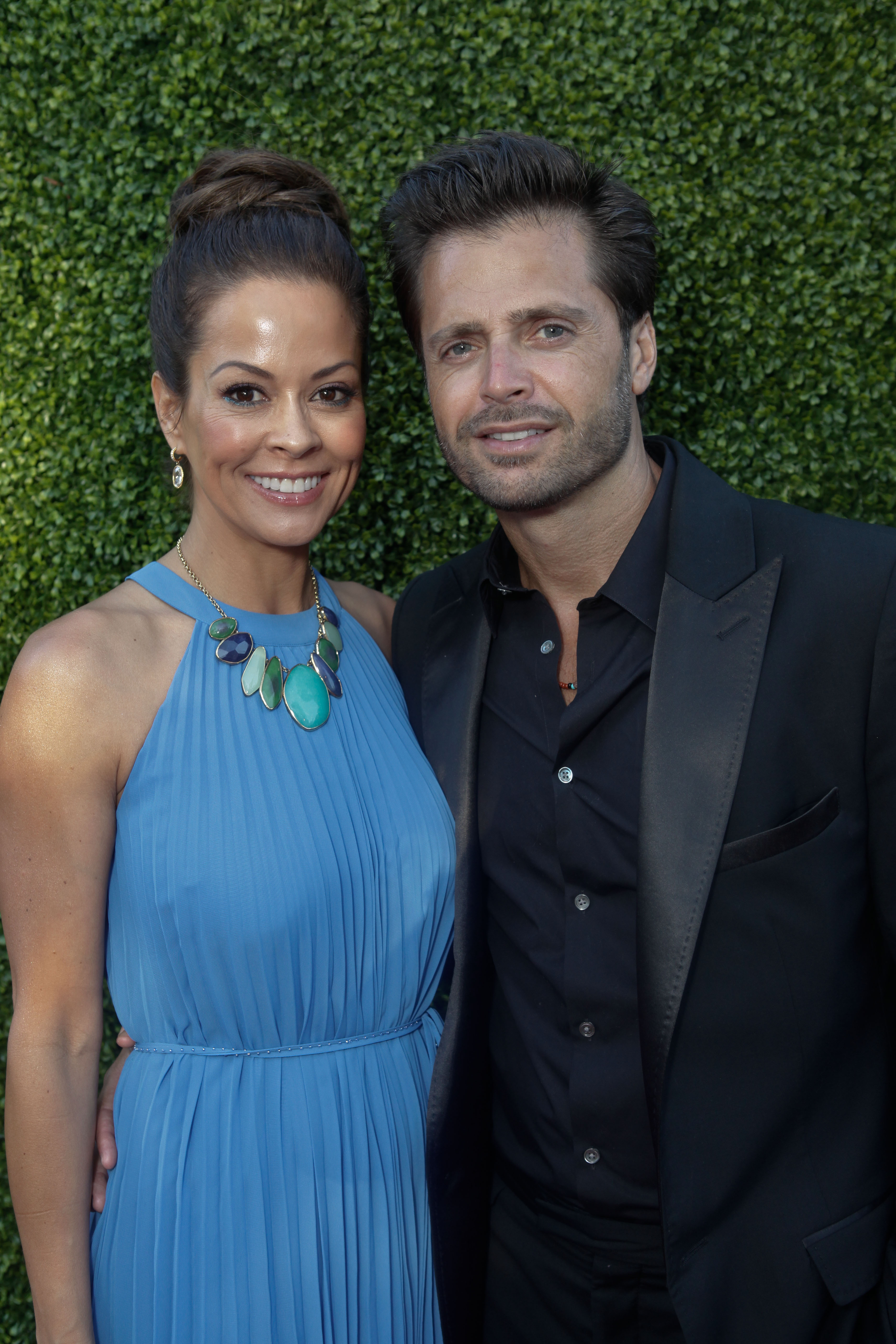 Brooke Burke et David Charvet assistent à la 14e édition de l'événement annuel Design Care de la fondation HollyRod, le 21 juillet 2012, à Malibu, en Californie. | Source : Getty Images