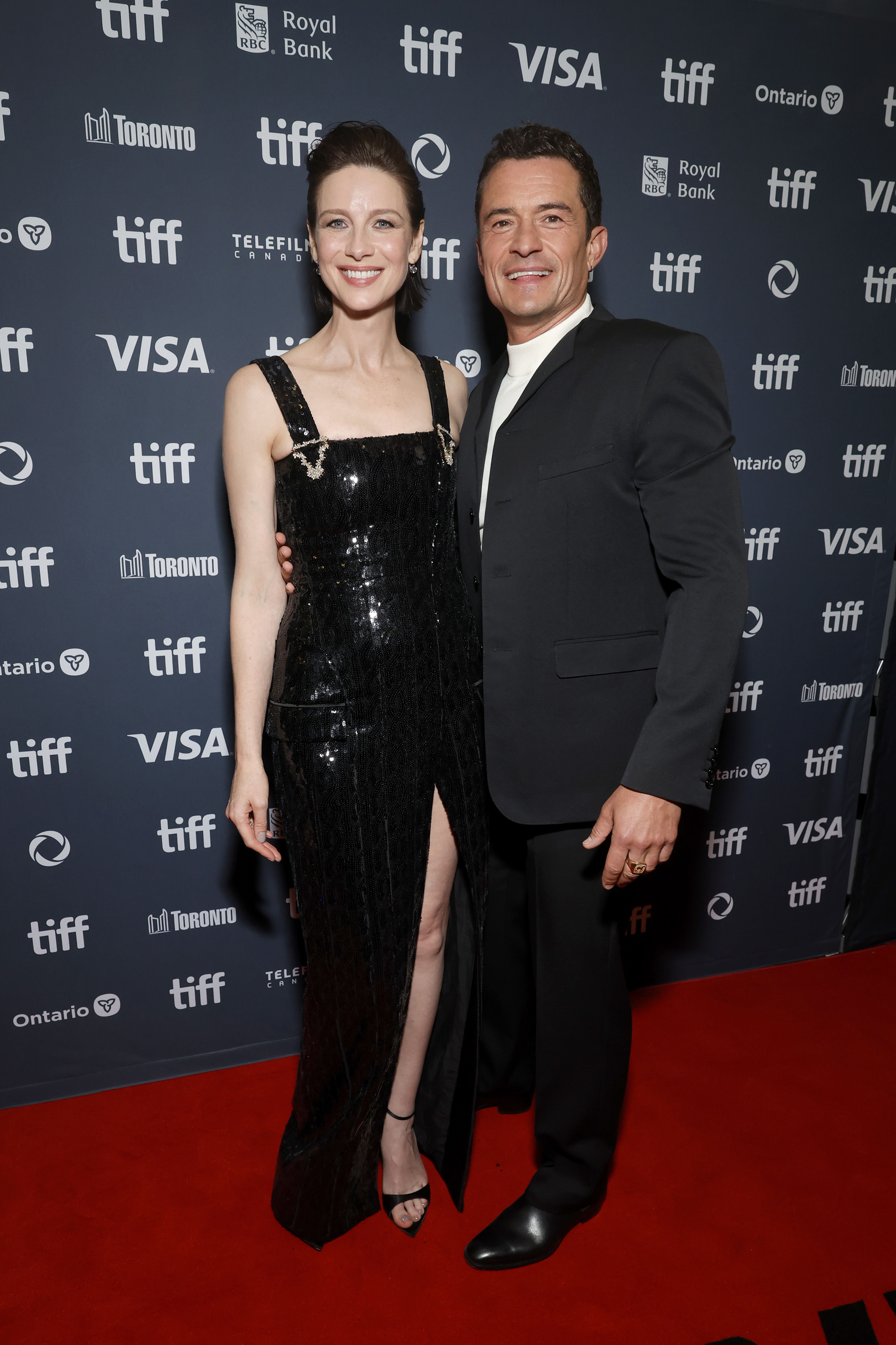 Caitriona Balfe et Orlando Bloom assistent à la première de « The Cut » lors du Festival international du film de Toronto, le 5 septembre 2024 | Source : Getty Images