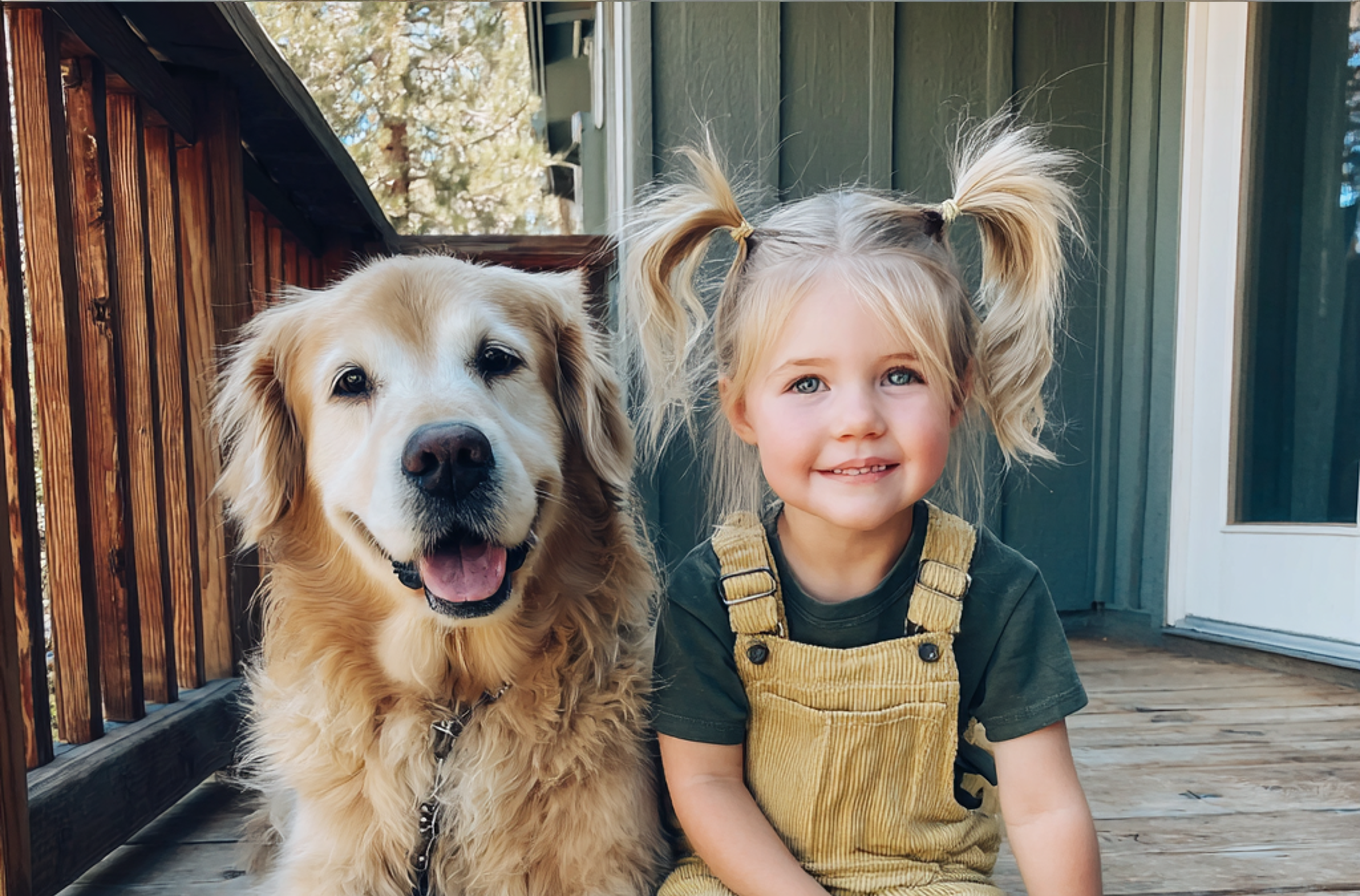 Une petite fille et un chien assis sur une marche de porche | Source : Midjourney