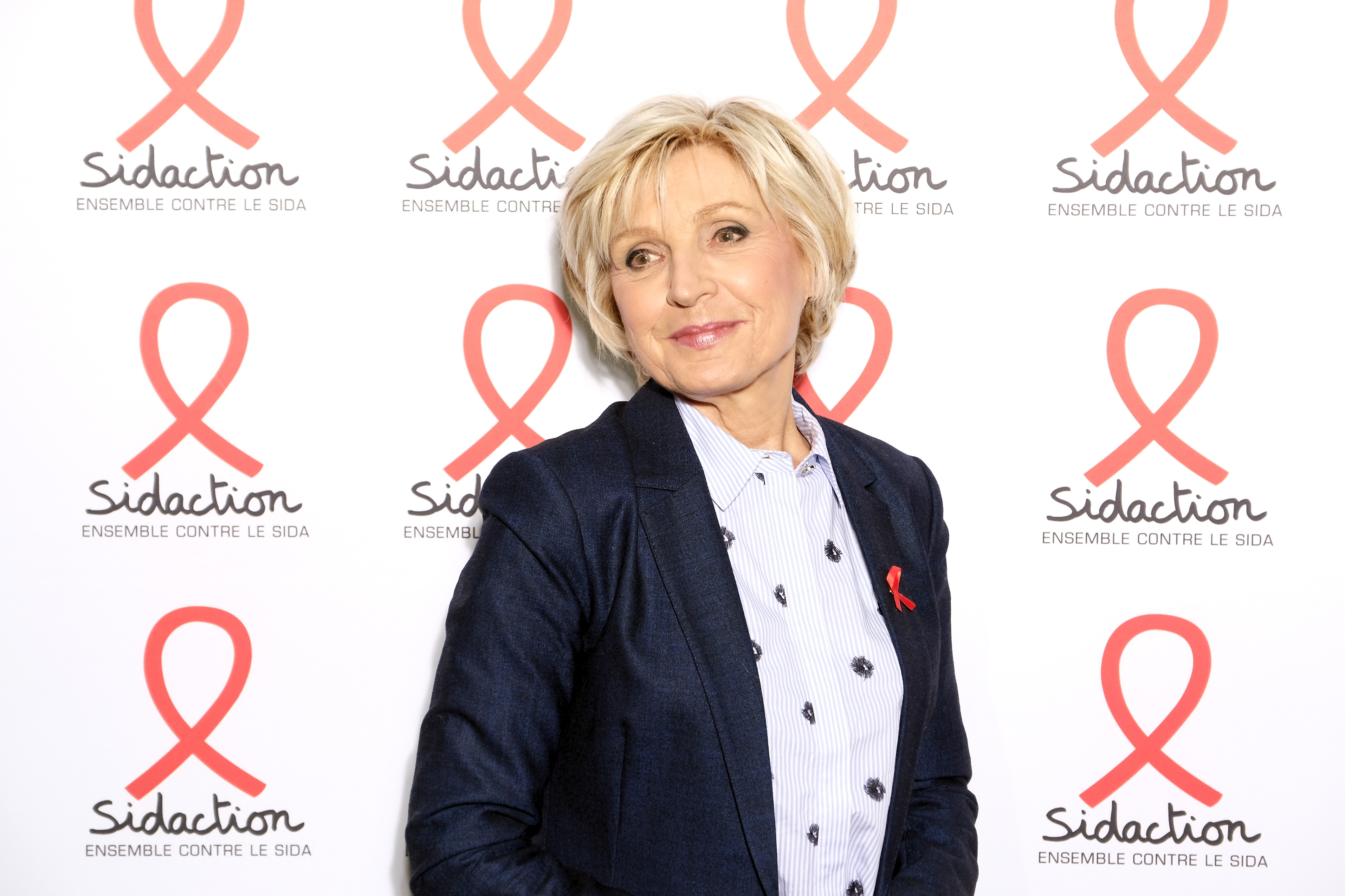 Évelyne Dhéliat participe au Sidaction 2022 dans le cadre de la semaine de la mode de Paris à la salle Wagram le 07 mars 2022 à Paris, France I Source : Getty Images