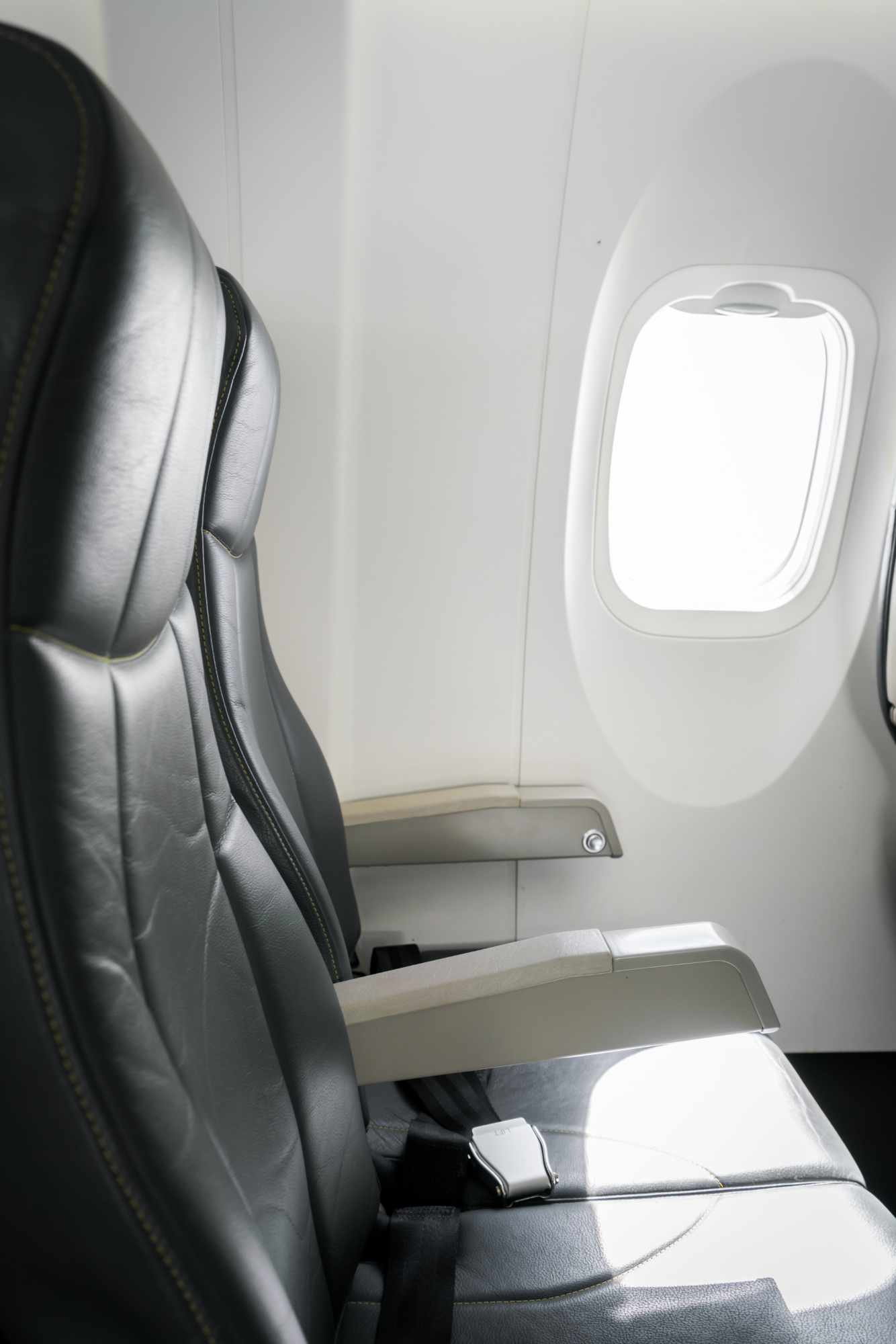 Sièges dans un avion | Source : Freepik