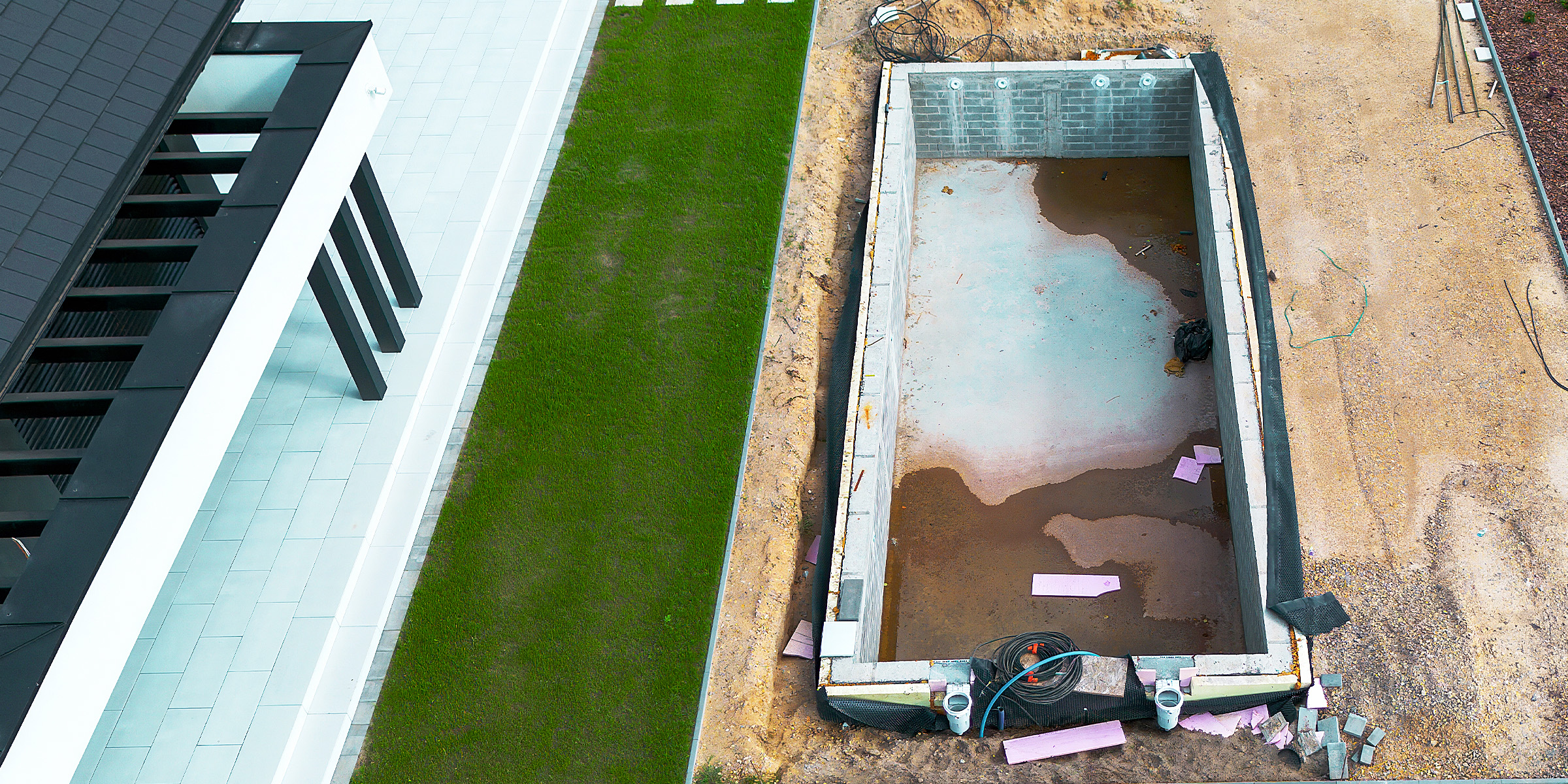 Vue aérienne d'un chantier de construction de piscine | Source : Shutterstock