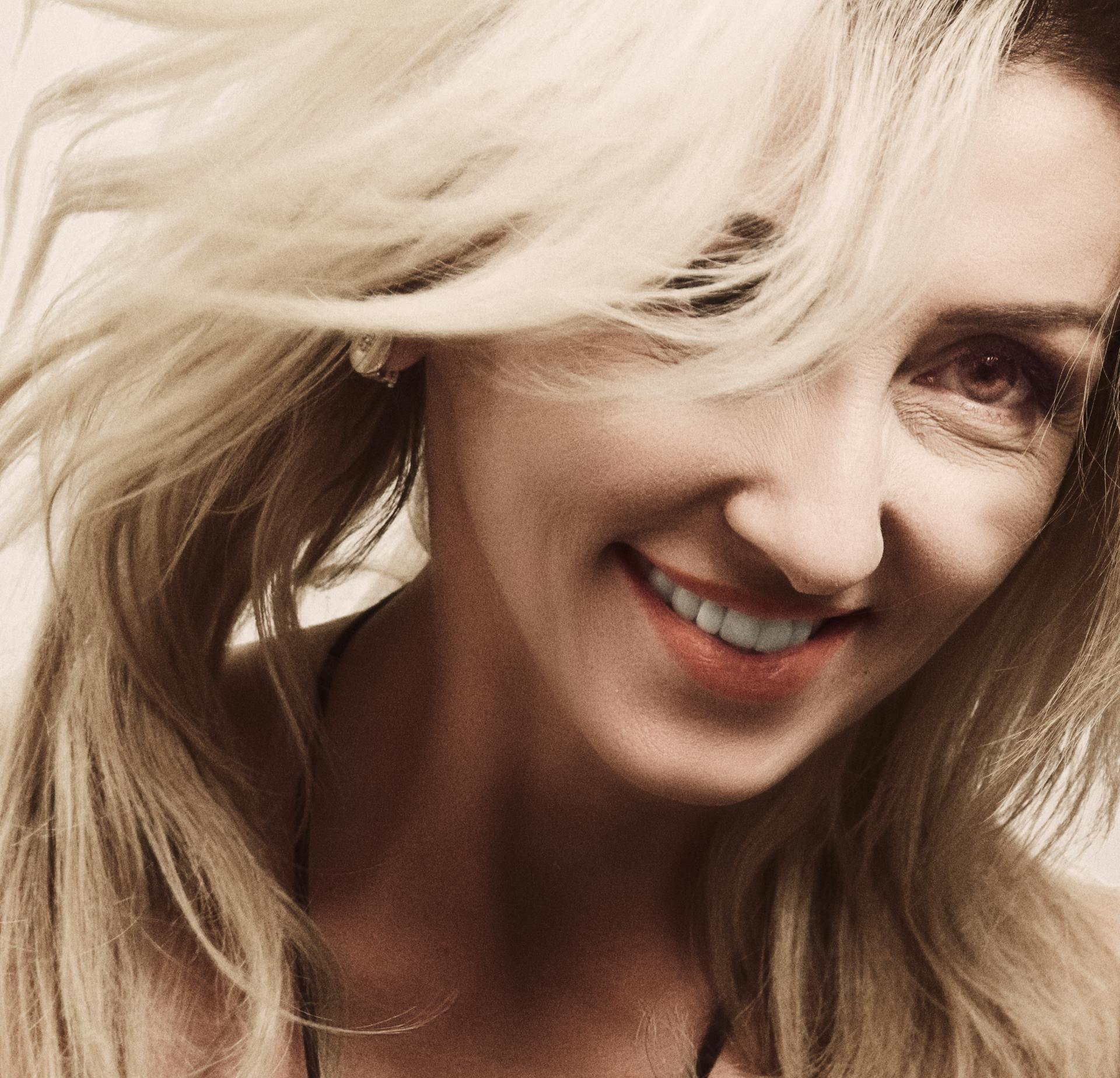 Une femme souriante | Source : Pexels