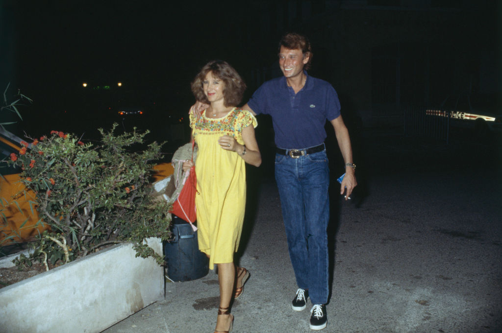 Johnny Hallyday et Nathalie Baye à Fréjus pour la dernière du spectacle du chanteur. Nathalie Baye donnera naissance quelques mois plus tard à leur fille Laura Smet I Source : Getty Images