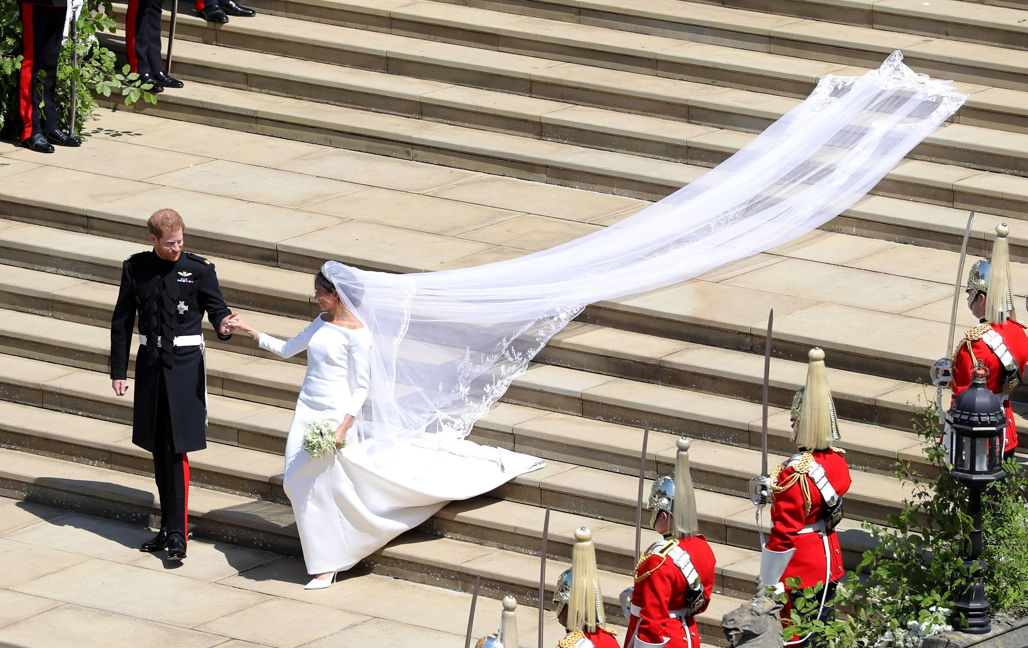 Le prince Harry et Meghan Markle le jour de leur mariage à la chapelle Saint-George à Windsor, en Angleterre, le 19 mai 2018. | Source : Getty Images