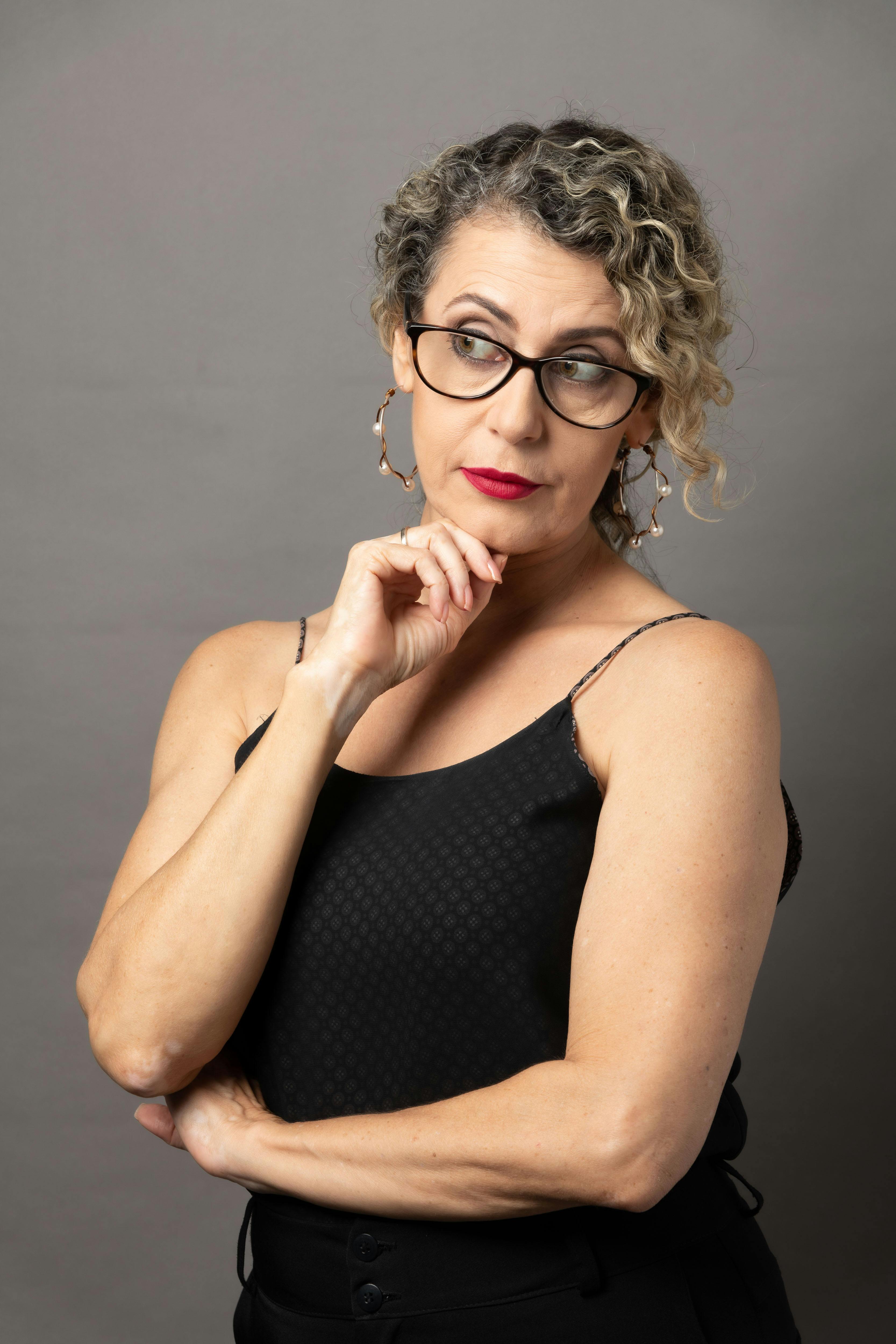 A woman in a black dress | Source: Pexels