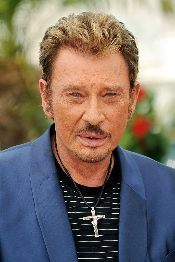 CANNES - 17 MAI : Johnny Hallyday assiste au photocall de 'Vengeance' au Palais Des Festival pendant le 62ème Festival International du Film de Cannes le 17 mai 2009 à Cannes, France. (Photo par Anthony Harvey/Getty Images)