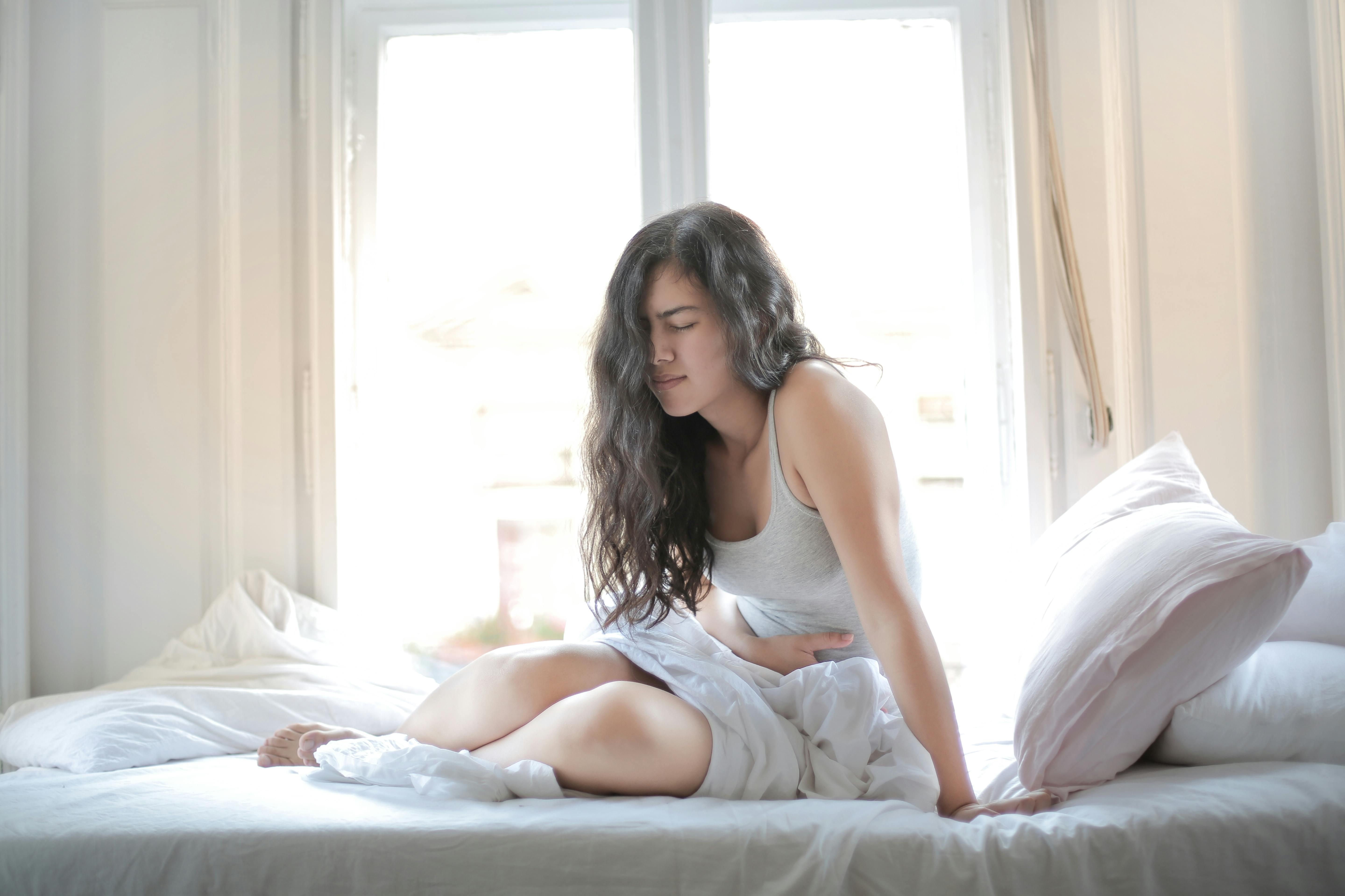Une femme qui se sent malade | Source : Pexels