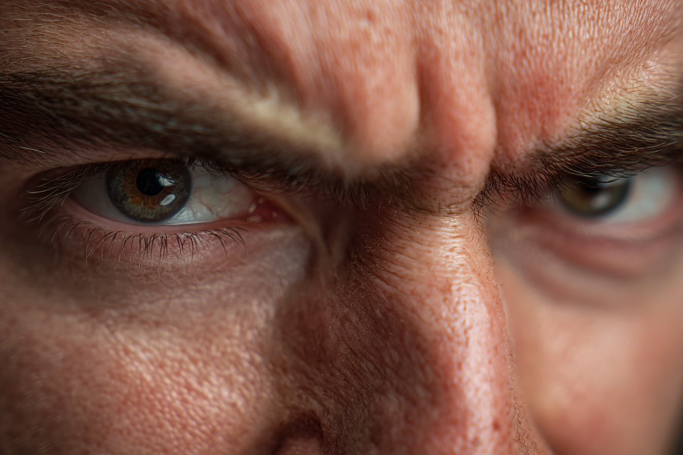 Un gros plan sur les yeux d'un homme | Source : Midjourney