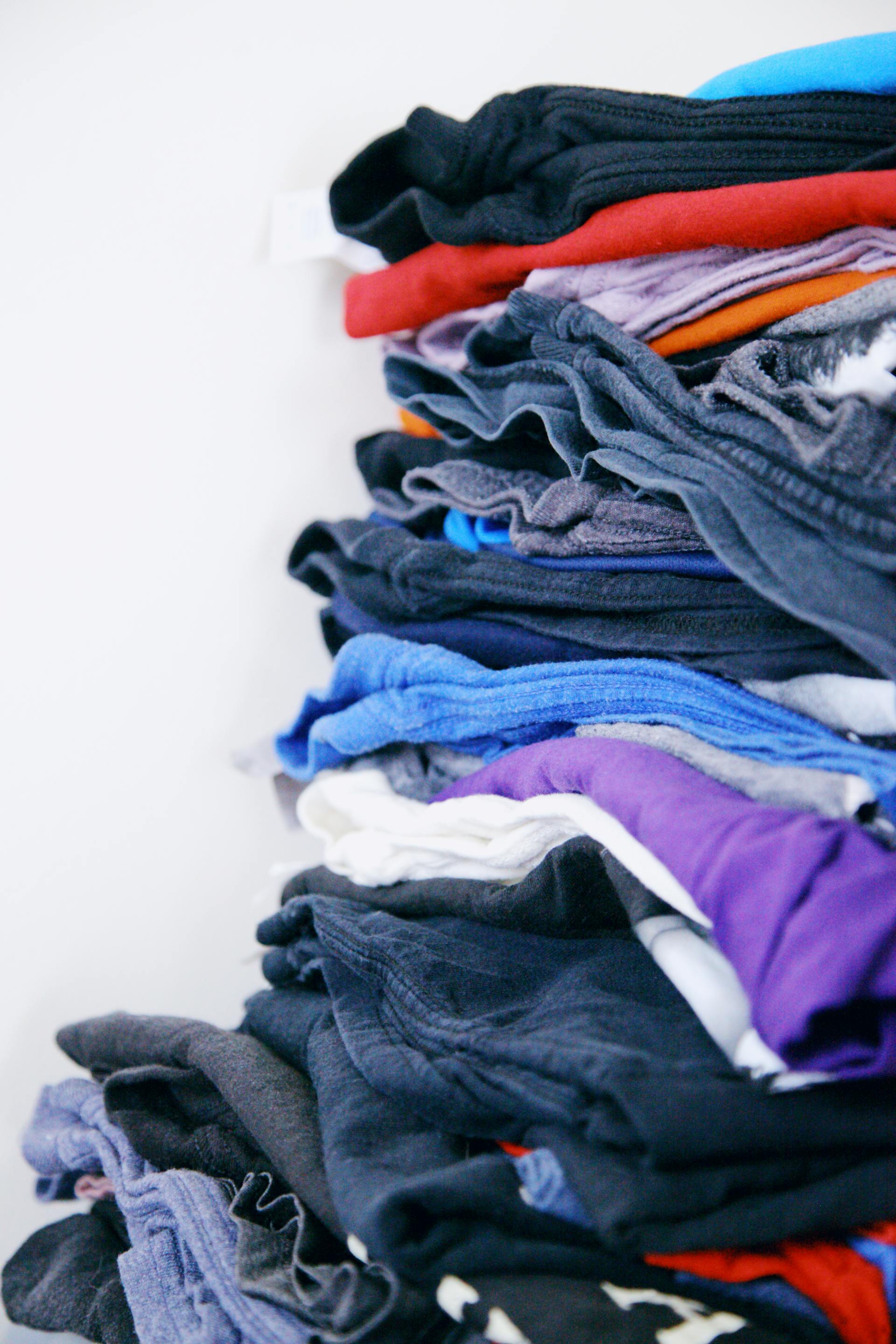 Photo en gros plan de vêtements pliés | Source : Pexels
