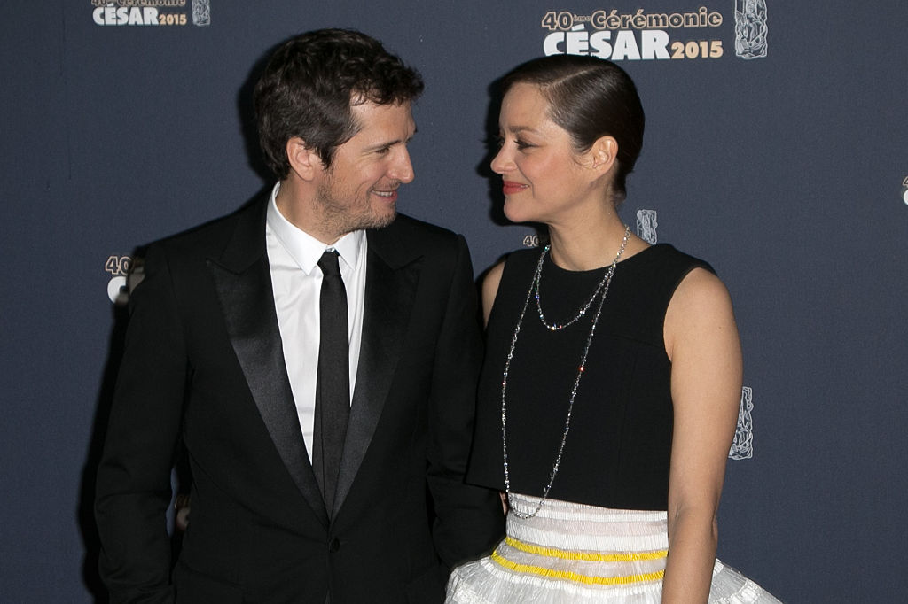 Guillaume Canet et Marion Cotillard assistent à la remise des prix du film 'CESARS' au Théâtre du Chatelet le 20 février 2015 à Paris, France. (Photo par Marc Piasecki/WireImage)