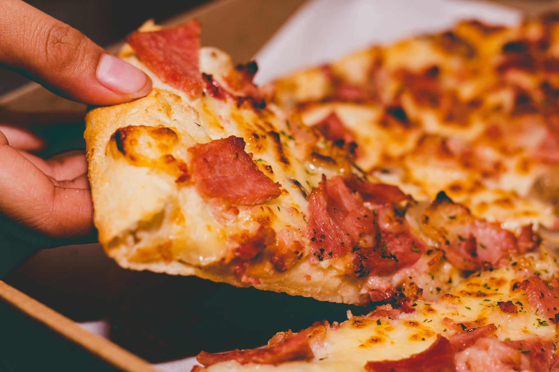 Une part de pizza | Source : Pexels