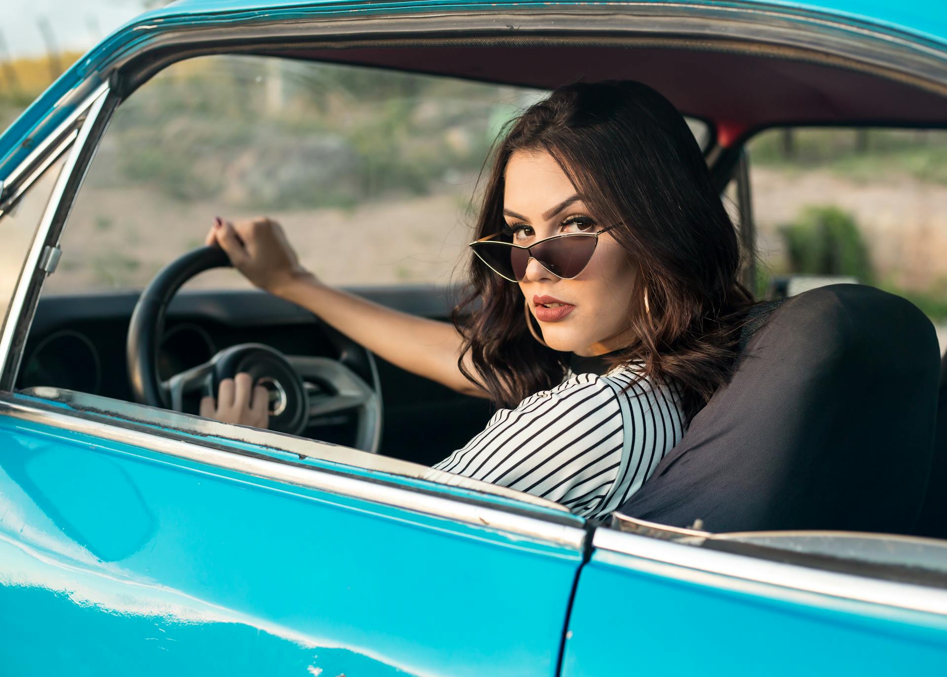 Une femme au volant d'une voiture | Source : Pexels