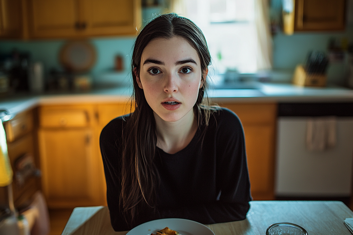 Une jeune femme dans une cuisine | Source : Midjourney